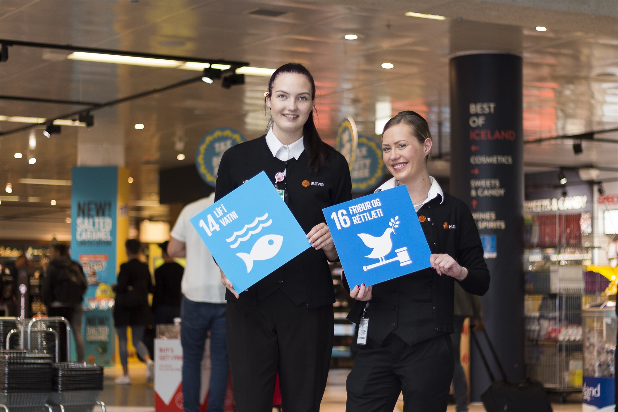 Two employees showing Sustainable development goals
